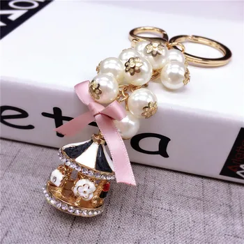 Korejski trendy Merry-go-round pearl keychain nakit za ženske vrečko avto opremo